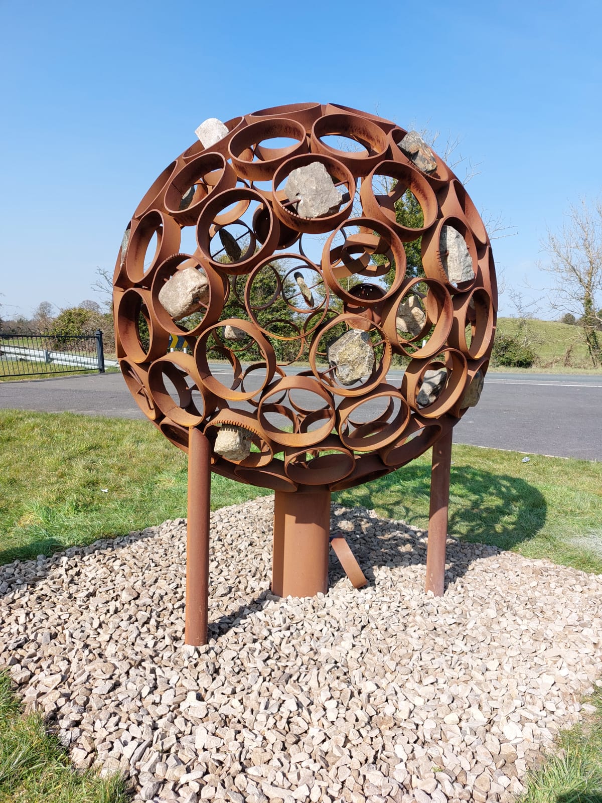 Circle of Courage sphere steel sculpture
